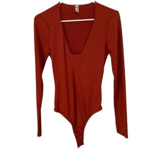 We The Free Dark Orange Stretchy Long Sleeve Ribbed V Neck Bodysuit. Size Small.